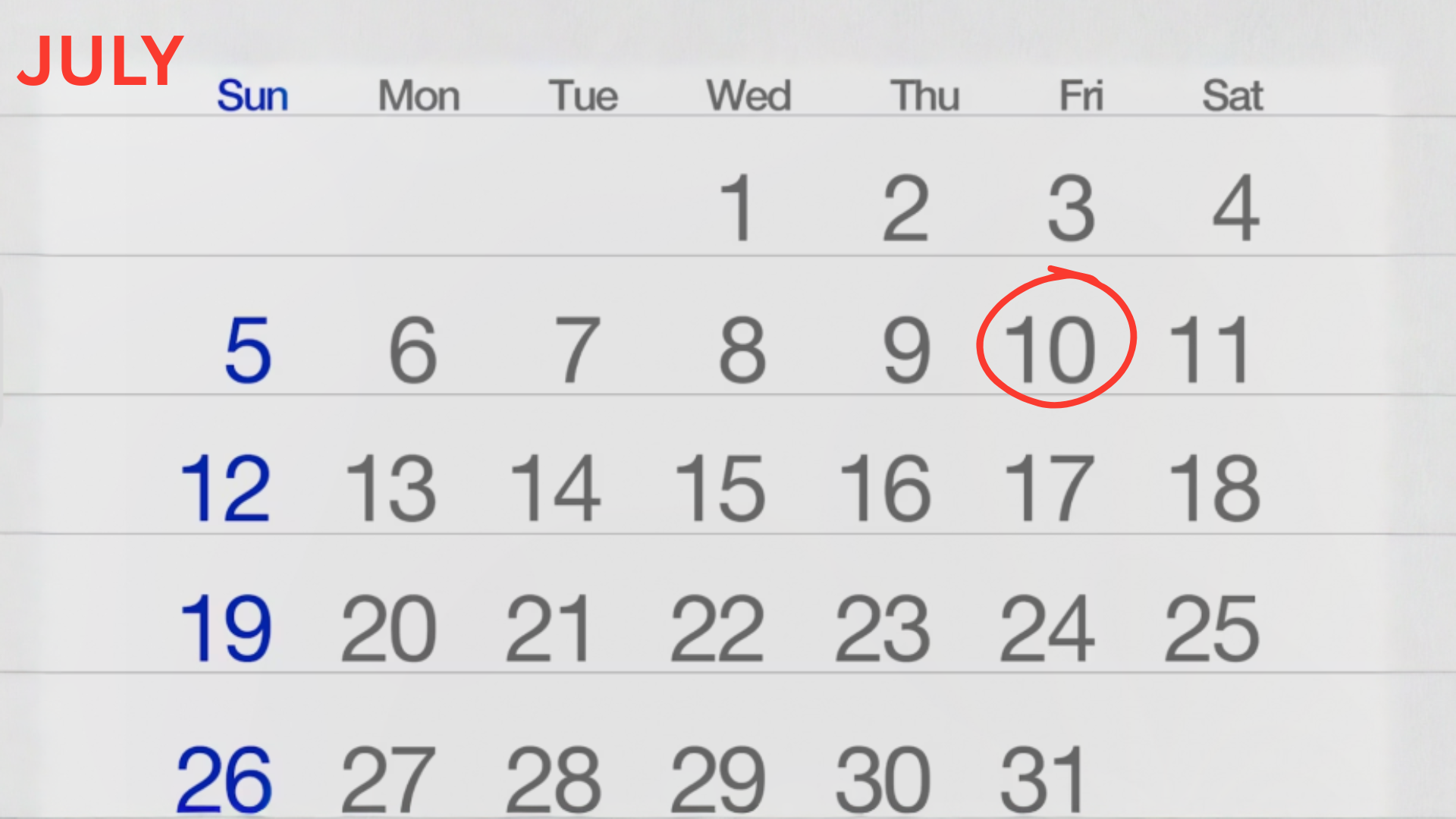 A calendar page for July has a red circle drawn around the number ten.