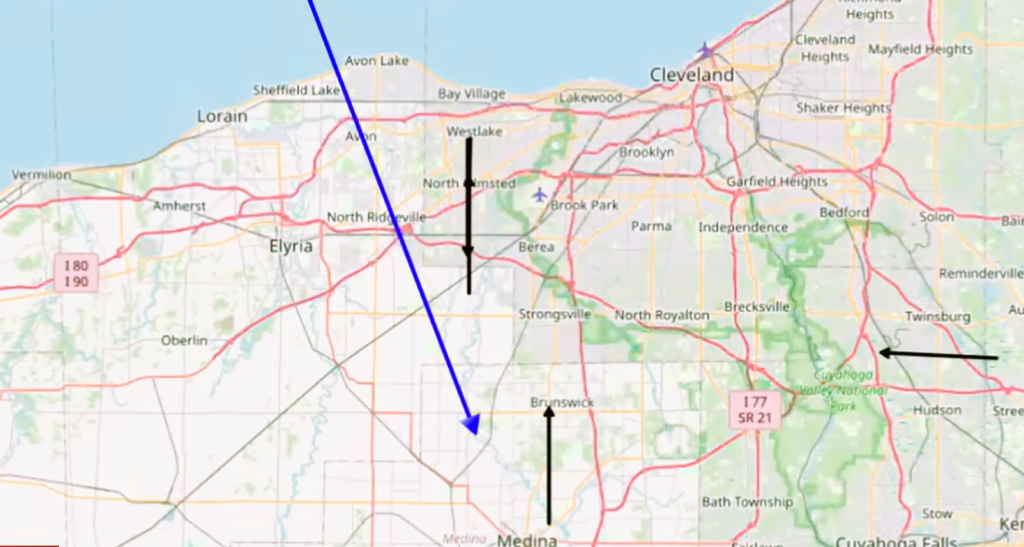 Map of Cleveland area showing trajectory line and directional arrows.