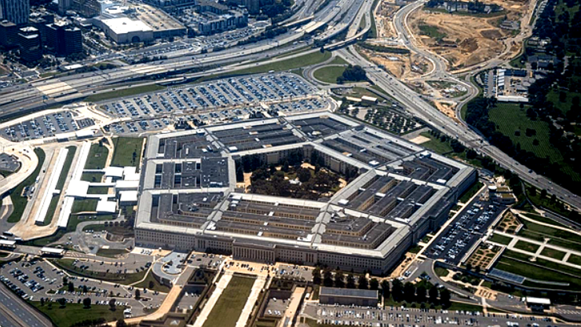 A classic aerial view of the Pentagon building in Arlington, Virginia, showing its iconic five-sided architecture.
