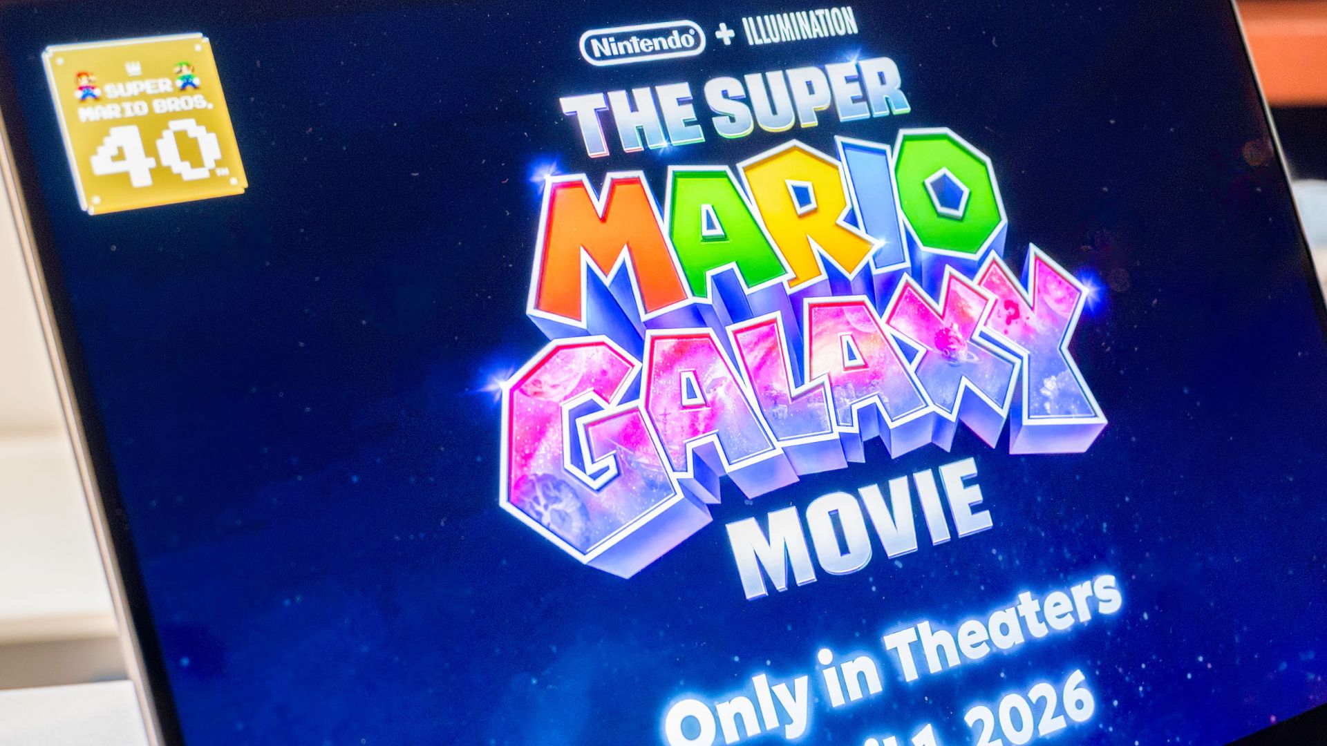 Super mario galaxy movie start in the screen of a laptop computer.