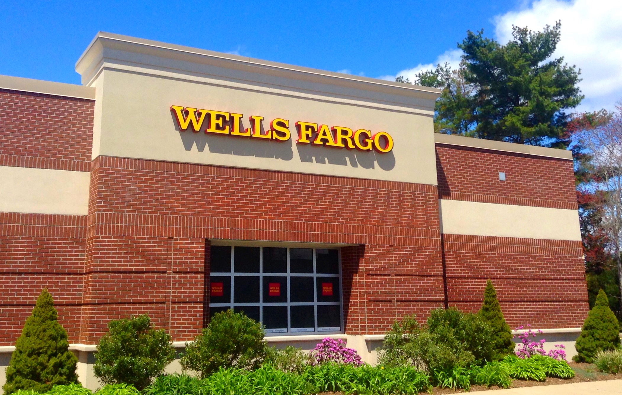 Wells Fargo bank branch exterior with company signage on the building facade.