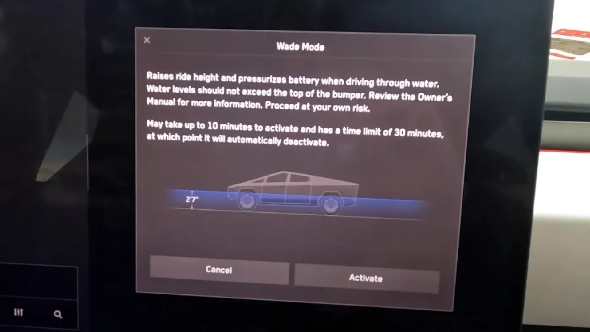 Tesla Cybertruck dashboard screen displaying a “Wade Mode” warning message.