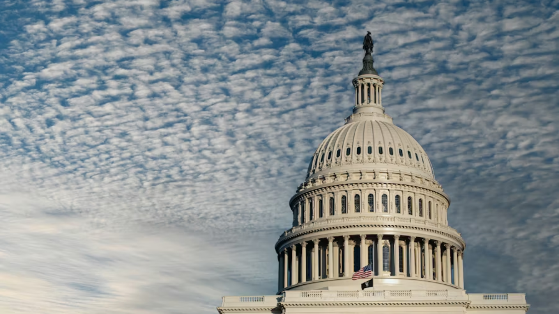 A low-angle daytime shot of the U.S. Capitol Building dome in Washington, D.C.