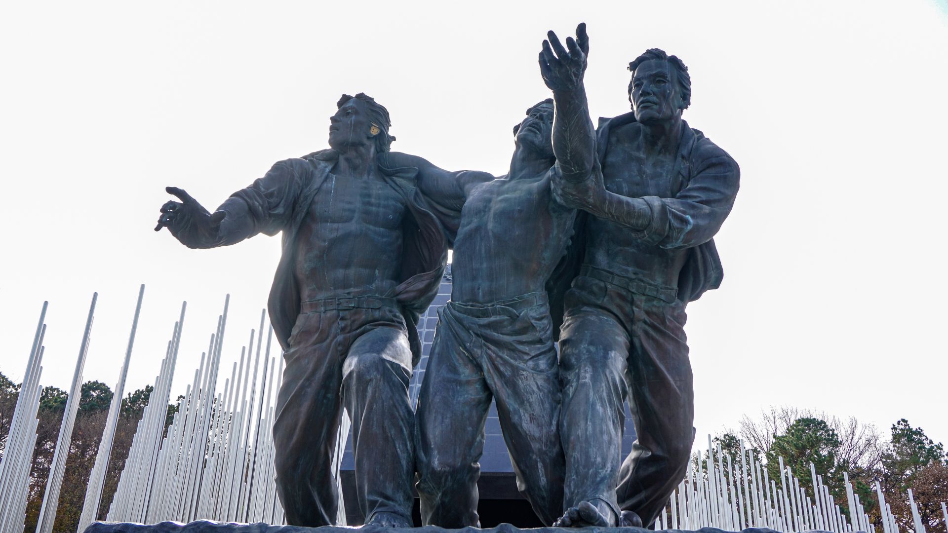 Bronze sculpture of three male figures at the 5.18 Memorial Park in Gwangju, South Korea, commemorating the May 18th Gwangju Uprising (Gwangju Democratization Movement) of 1980.