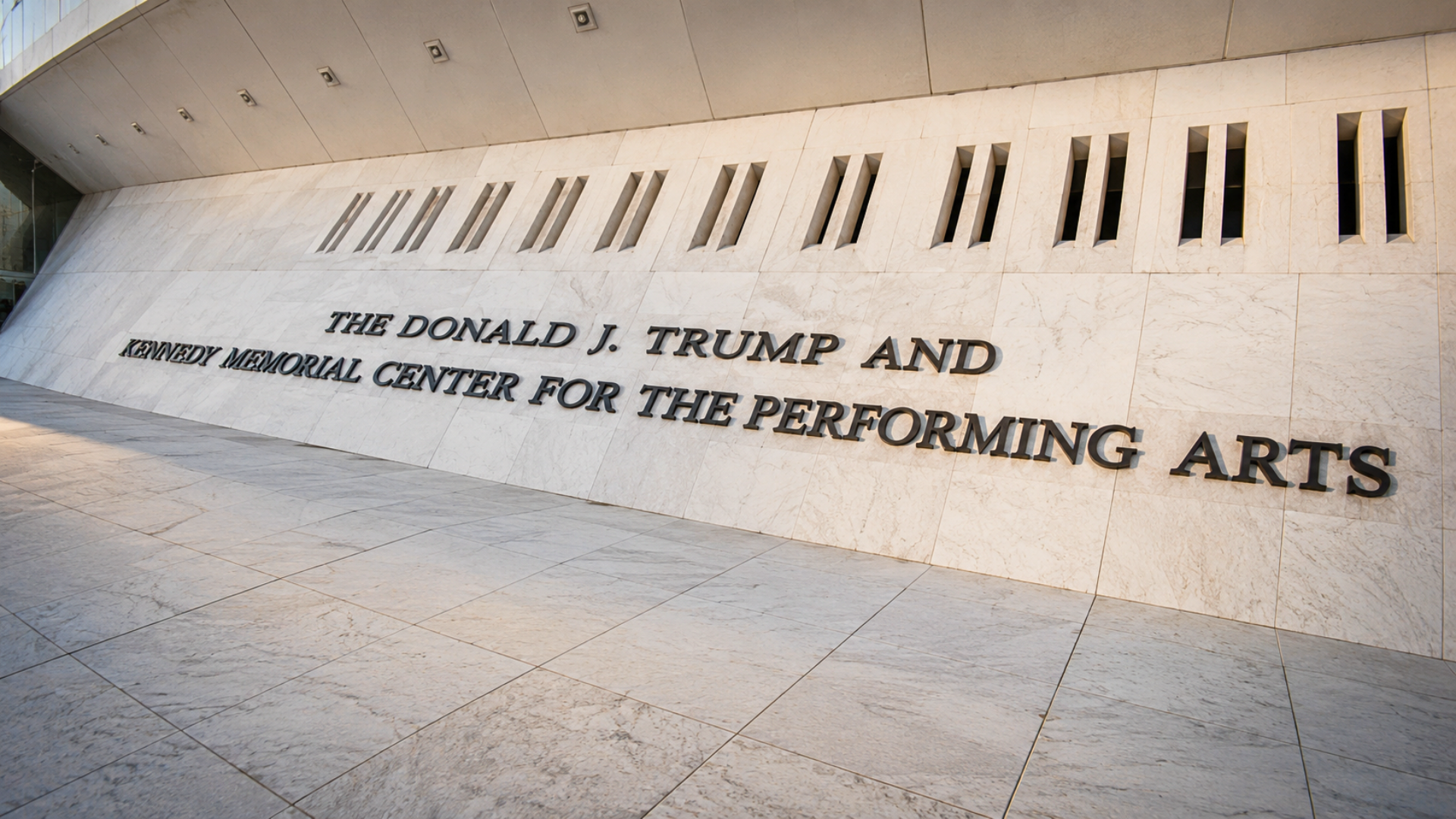 Kennedy Center exterior showing the Donald J. Trump name on the performing arts center wall.