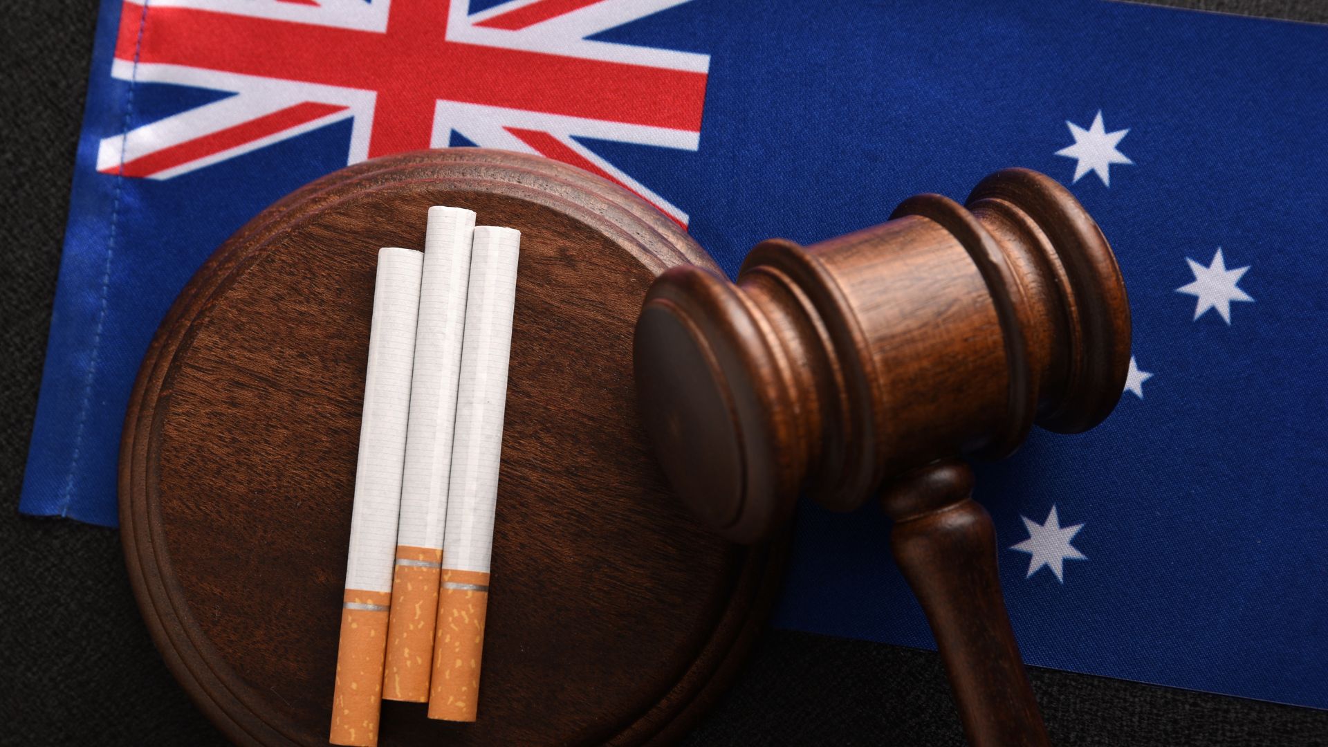 Cigarettes With an Australian Flag in the Background.