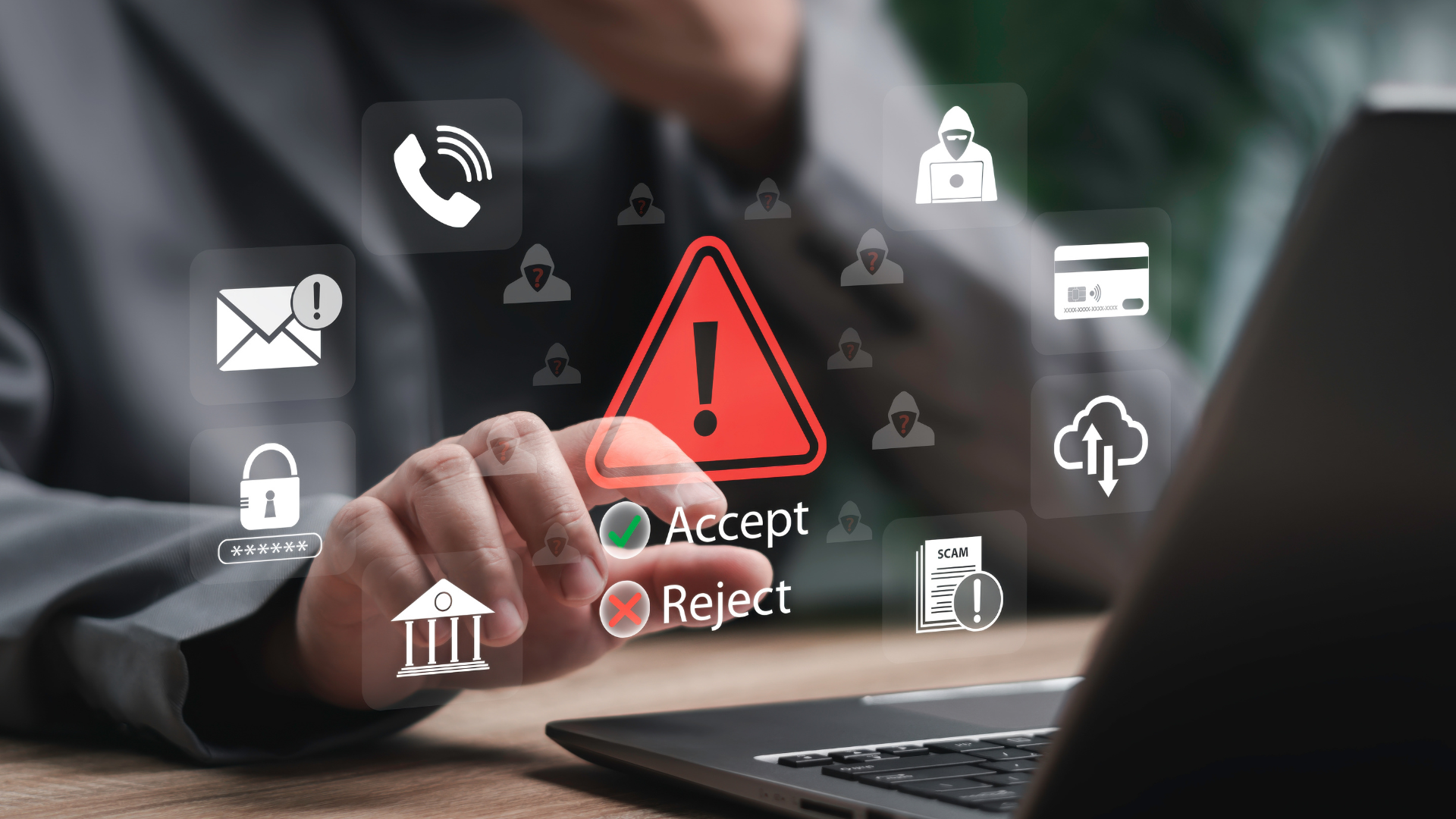 A person using a laptop with a glowing red warning sign and cybersecurity threat icons floating above the keyboard.