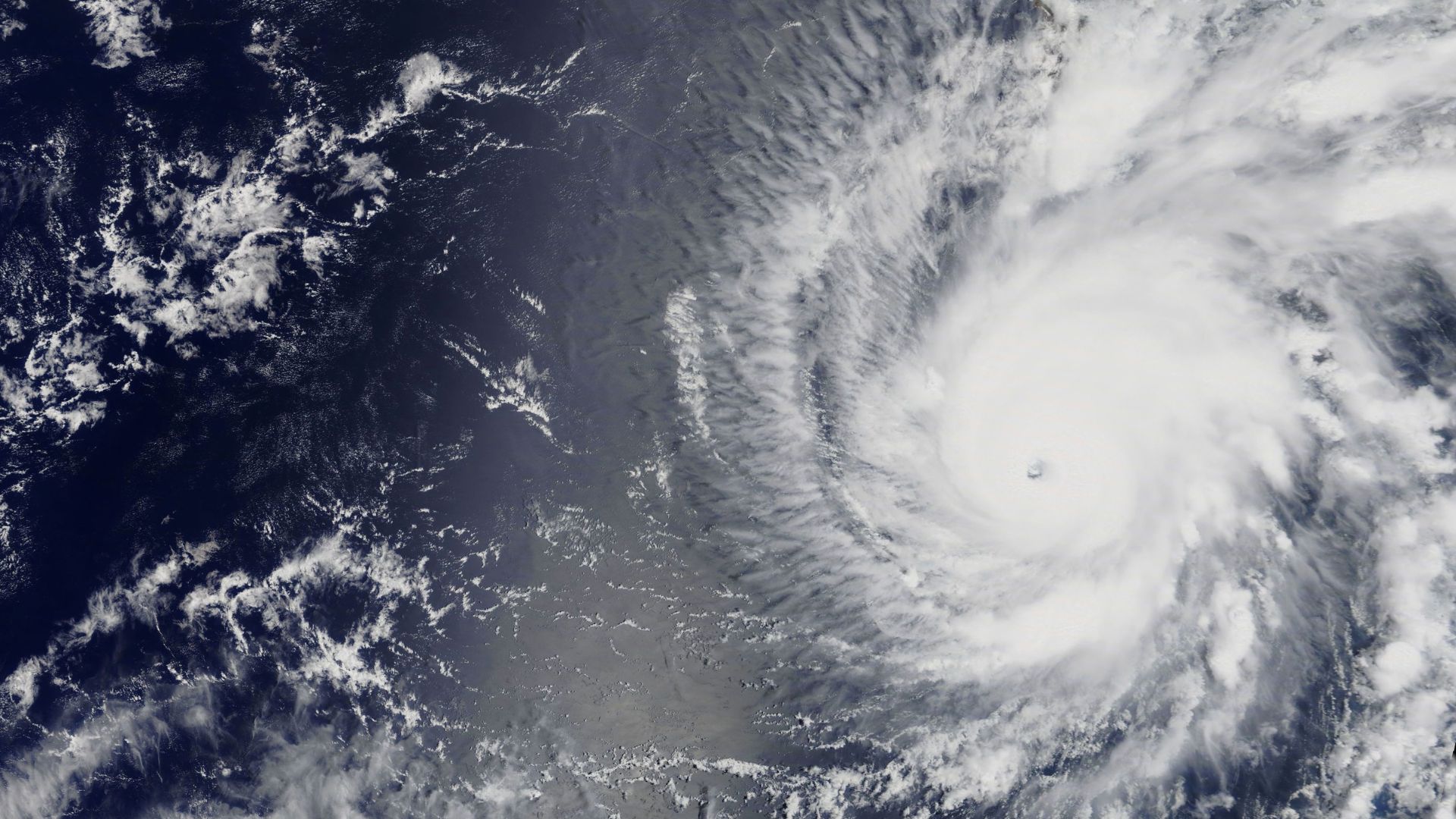 A satellite view showing a hurricane and the El Niño climate phenomenon.