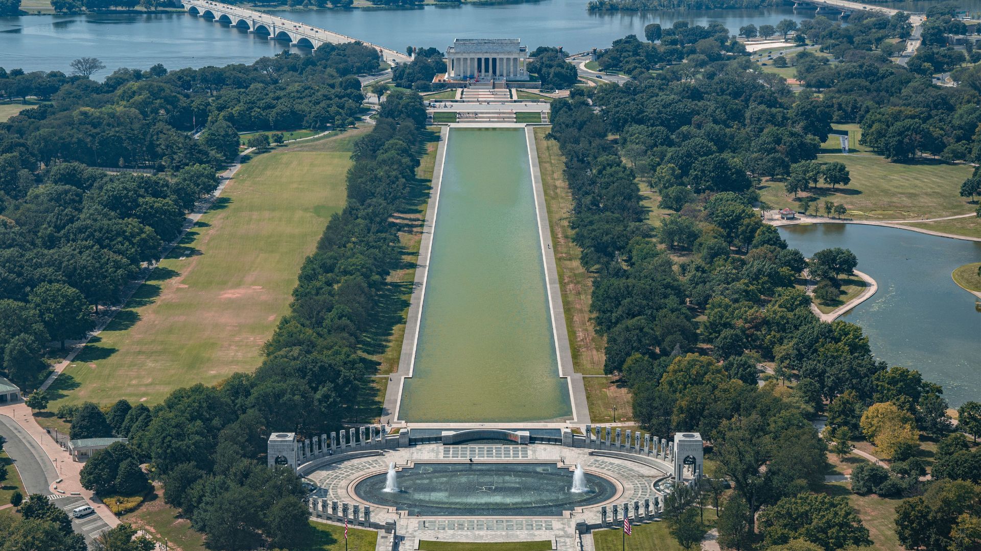 Aerial view of the Lincoln Memorial reflecting pool and WWII Memorial fountain.