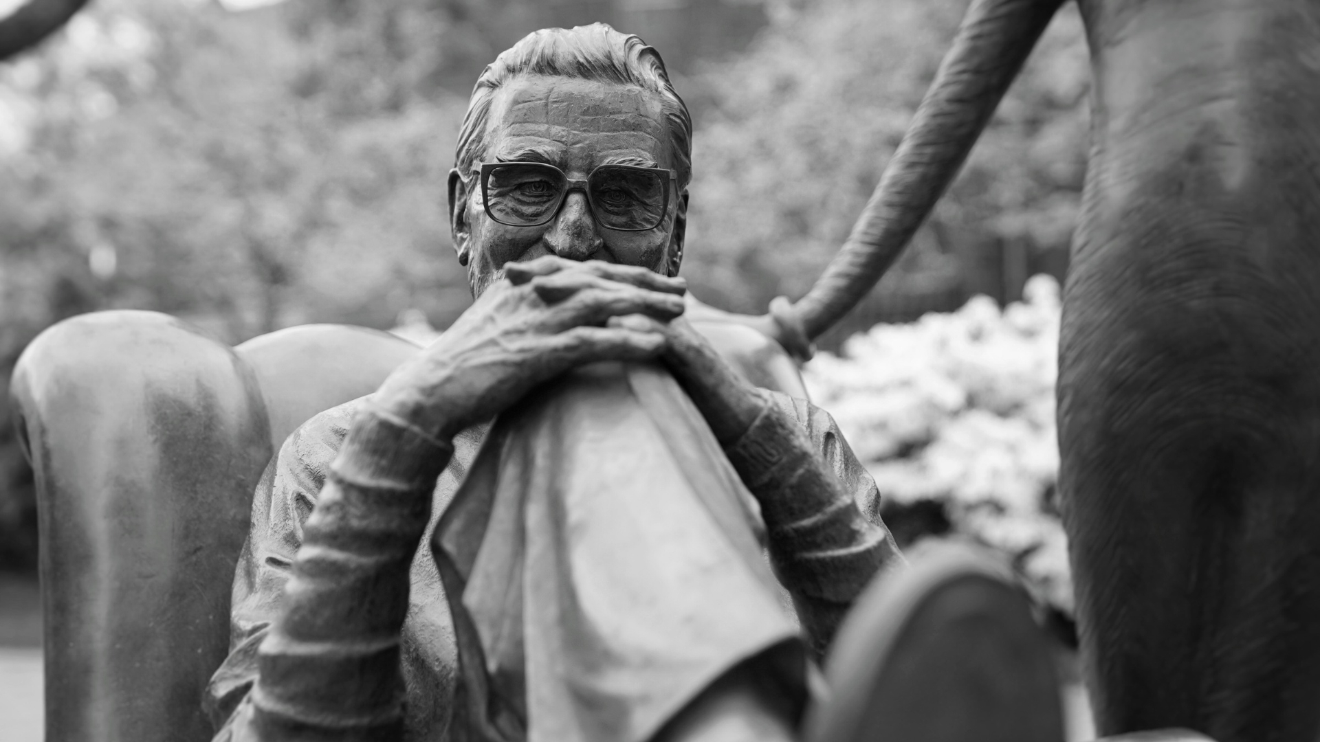 Close up on the sculpture of Dr. Seuss at his memorial sculpture garden in black and white.