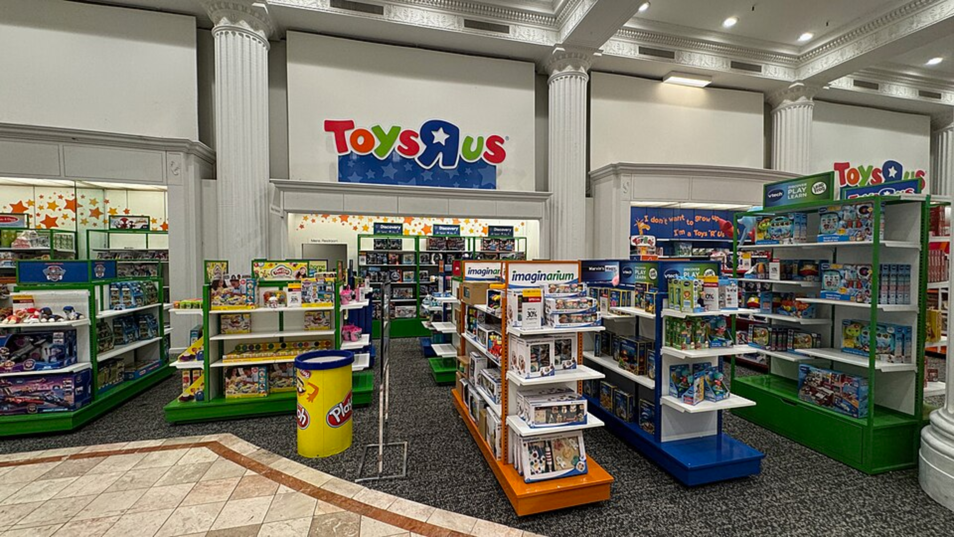 Toys "R" Us interior showing various toy displays.